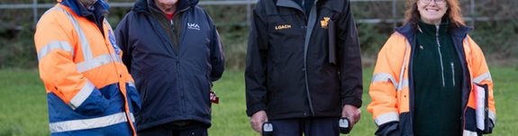 A group of male and female endurance officials