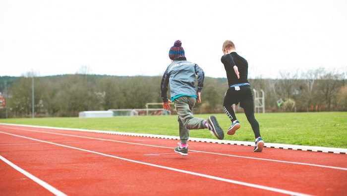 Two children running